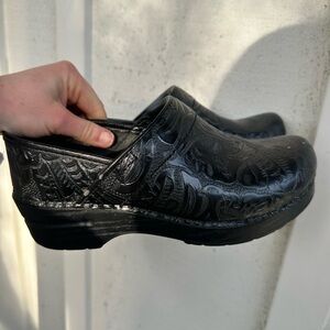 Black Dansko Embossed Leather Clogs